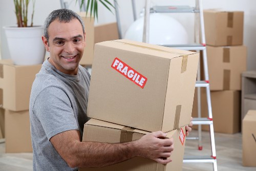 Office relocation planning in Kentish Town with moving boxes and workspace setup