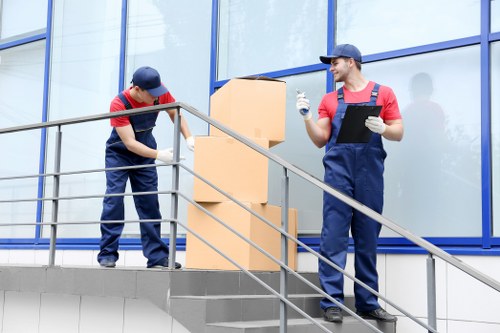 Removal van and movers during a North London relocation