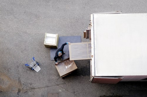 House removals team planning a move in Kentish Town street