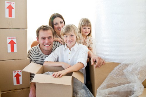 Movers navigating tight access in a Kentish Town property